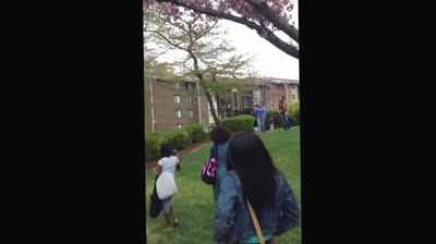 Chaotic Street Fight Involving Mother and Daughter